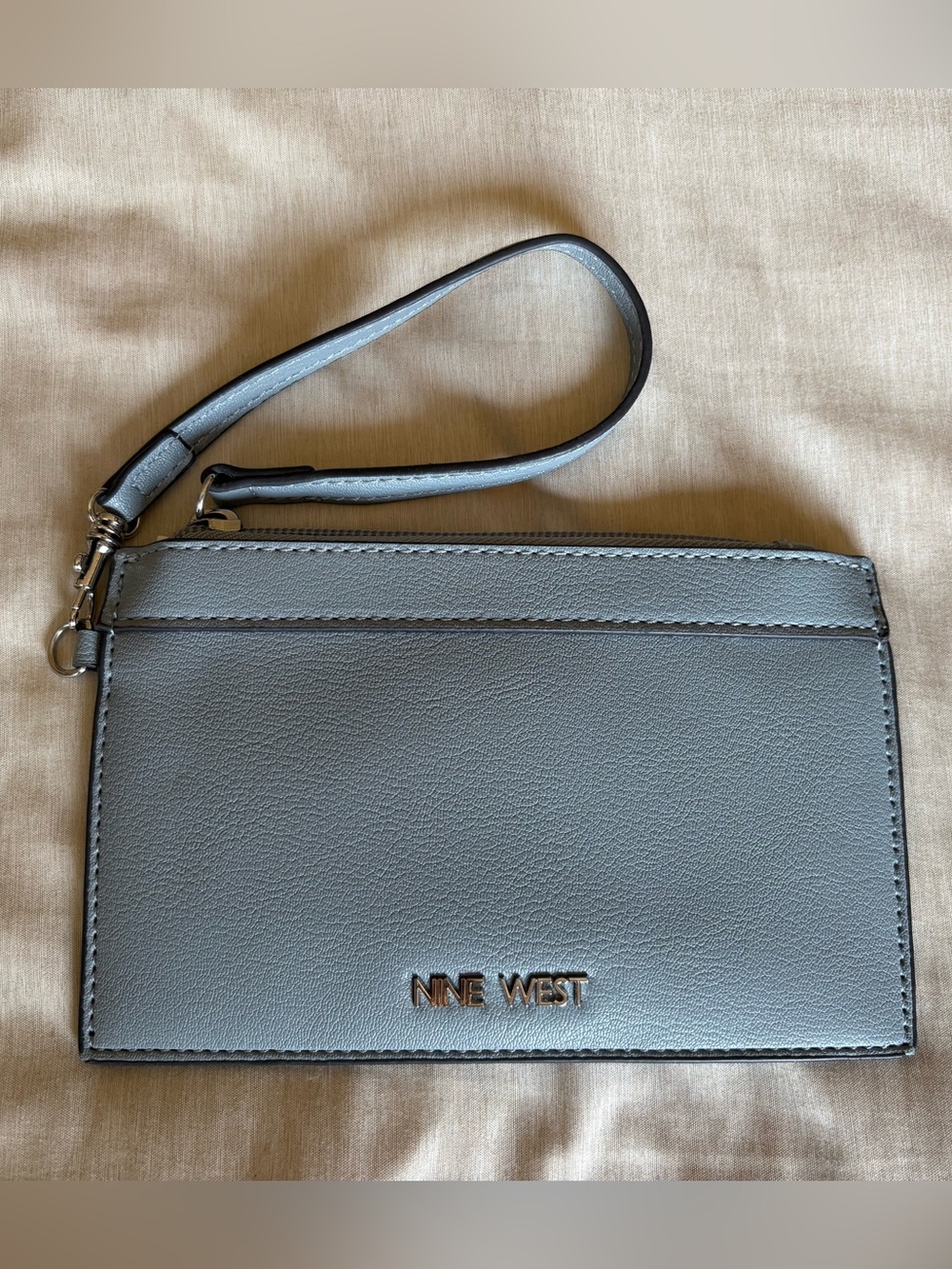 Nine West wristlet.